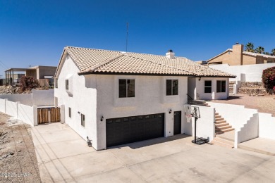 Welcome to this beautifully updated home in the desirable on London Bridge Golf Course in Arizona - for sale on GolfHomes.com, golf home, golf lot