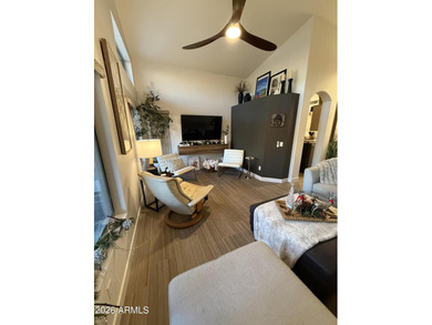 This beautiful home blends modern upgrades with resort-style on Tuscany Falls At Pebble Creek in Arizona - for sale on GolfHomes.com, golf home, golf lot