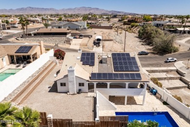 Welcome to this beautifully updated home in the desirable on London Bridge Golf Course in Arizona - for sale on GolfHomes.com, golf home, golf lot