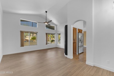 This beautiful home blends modern upgrades with resort-style on Tuscany Falls At Pebble Creek in Arizona - for sale on GolfHomes.com, golf home, golf lot