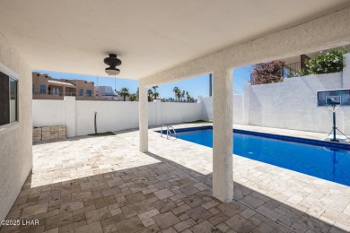 Welcome to this beautifully updated home in the desirable on London Bridge Golf Course in Arizona - for sale on GolfHomes.com, golf home, golf lot