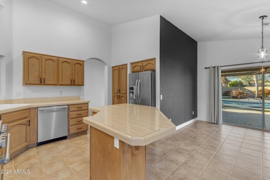 This beautiful home blends modern upgrades with resort-style on Tuscany Falls At Pebble Creek in Arizona - for sale on GolfHomes.com, golf home, golf lot