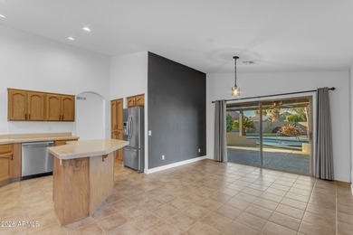 This beautiful home blends modern upgrades with resort-style on Tuscany Falls At Pebble Creek in Arizona - for sale on GolfHomes.com, golf home, golf lot