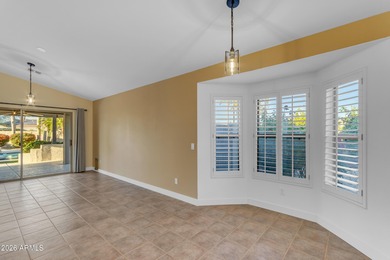 This beautiful home blends modern upgrades with resort-style on Tuscany Falls At Pebble Creek in Arizona - for sale on GolfHomes.com, golf home, golf lot