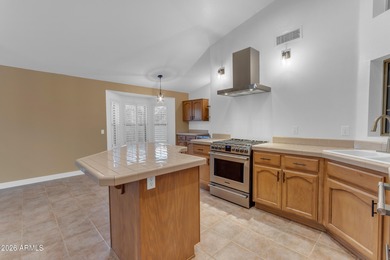 This beautiful home blends modern upgrades with resort-style on Tuscany Falls At Pebble Creek in Arizona - for sale on GolfHomes.com, golf home, golf lot