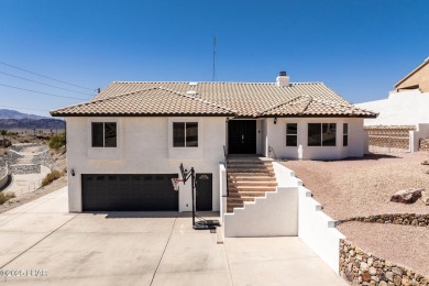Welcome to this beautifully updated home in the desirable on London Bridge Golf Course in Arizona - for sale on GolfHomes.com, golf home, golf lot