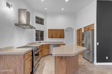 This beautiful home blends modern upgrades with resort-style on Tuscany Falls At Pebble Creek in Arizona - for sale on GolfHomes.com, golf home, golf lot