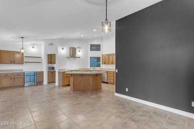 This beautiful home blends modern upgrades with resort-style on Tuscany Falls At Pebble Creek in Arizona - for sale on GolfHomes.com, golf home, golf lot