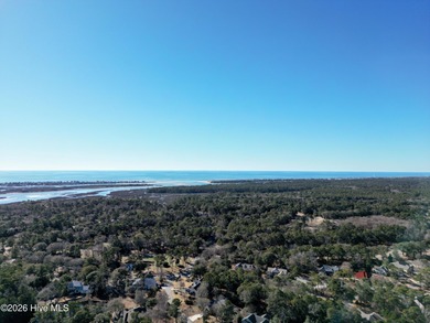Set on more than half an acre, this surveyed and partially on Lockwood Folly Country Club in North Carolina - for sale on GolfHomes.com, golf home, golf lot