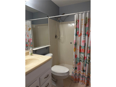 Beautiful first-floor condo in a desirable 55+ community with on The American Golf Club in Florida - for sale on GolfHomes.com, golf home, golf lot