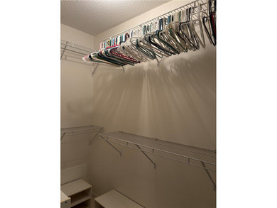 Beautiful first-floor condo in a desirable 55+ community with on The American Golf Club in Florida - for sale on GolfHomes.com, golf home, golf lot