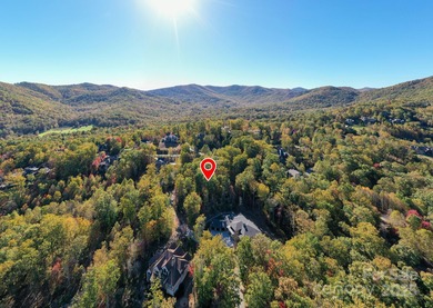Experience refined mountain living at its finest within The on The Cliffs At Walnut Cove in North Carolina - for sale on GolfHomes.com, golf home, golf lot