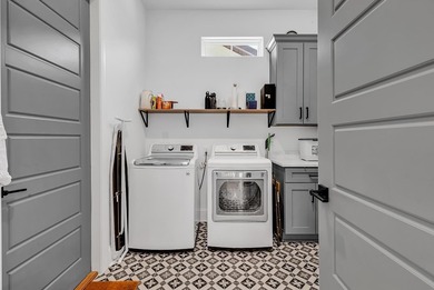 This contemporary home in Myrtle Beach offers clean design and on Cane Patch Driving Range in South Carolina - for sale on GolfHomes.com, golf home, golf lot