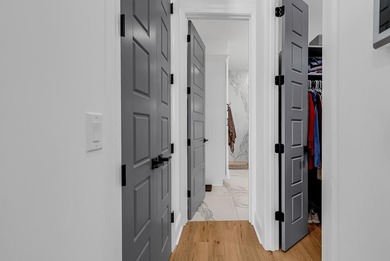 This contemporary home in Myrtle Beach offers clean design and on Cane Patch Driving Range in South Carolina - for sale on GolfHomes.com, golf home, golf lot