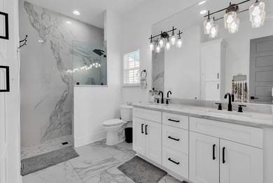 This contemporary home in Myrtle Beach offers clean design and on Cane Patch Driving Range in South Carolina - for sale on GolfHomes.com, golf home, golf lot