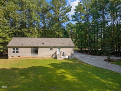 Welcome to your dream home opportunity in coveted Lake Royale! on River Golf and County Club at Lake Royale in North Carolina - for sale on GolfHomes.com, golf home, golf lot