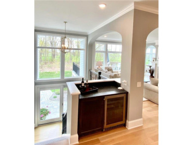 Stunning walk-out rambler custom built by Charles Cudd  and on Medina Golf and Country Club - Rolling Green in Minnesota - for sale on GolfHomes.com, golf home, golf lot