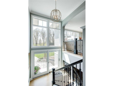Stunning walk-out rambler custom built by Charles Cudd  and on Medina Golf and Country Club - Rolling Green in Minnesota - for sale on GolfHomes.com, golf home, golf lot