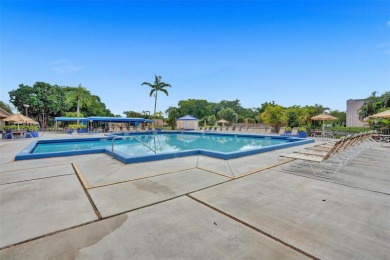 This property features a desirable open floor plan that on Sunrise Lakes Phase IV Golf Course in Florida - for sale on GolfHomes.com, golf home, golf lot