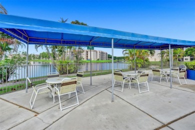 This property features a desirable open floor plan that on Sunrise Lakes Phase IV Golf Course in Florida - for sale on GolfHomes.com, golf home, golf lot