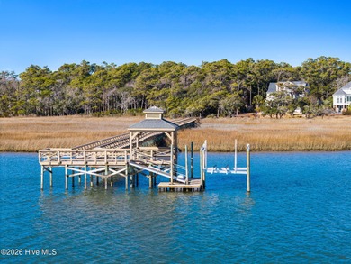 Intracoastal Waterway front luxury home with private dock on Lockwood Folly Country Club in North Carolina - for sale on GolfHomes.com, golf home, golf lot