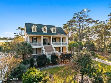 Intracoastal Waterway front luxury home with private dock on Lockwood Folly Country Club in North Carolina - for sale on GolfHomes.com, golf home, golf lot