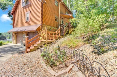 This beautifully maintained log home offers charm, character on Lake Mohawk Golf Club in Ohio - for sale on GolfHomes.com, golf home, golf lot