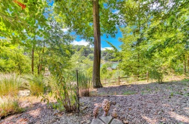 This beautifully maintained log home offers charm, character on Lake Mohawk Golf Club in Ohio - for sale on GolfHomes.com, golf home, golf lot