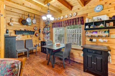 This beautifully maintained log home offers charm, character on Lake Mohawk Golf Club in Ohio - for sale on GolfHomes.com, golf home, golf lot