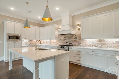 This beautifully designed 5-bedroom home with two bedrooms on on The Georgia Club in Georgia - for sale on GolfHomes.com, golf home, golf lot