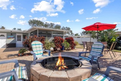 **NEW PRICE** High and Dry, 3-bedroom 2-bathroom concrete block on The Dunedin Country Club in Florida - for sale on GolfHomes.com, golf home, golf lot