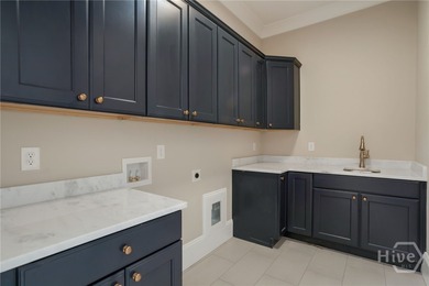 This beautifully designed 5-bedroom home with two bedrooms on on The Georgia Club in Georgia - for sale on GolfHomes.com, golf home, golf lot