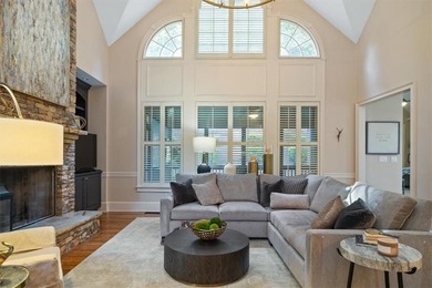 Discover timeless elegance and modern comfort in this on Woodmont Golf and Country Club in Georgia - for sale on GolfHomes.com, golf home, golf lot