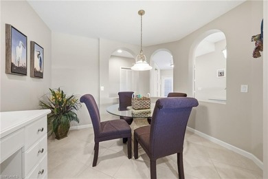 Fresh, light-filled and offered turnkey, this first-floor coach on The Rookery At Marco in Florida - for sale on GolfHomes.com, golf home, golf lot