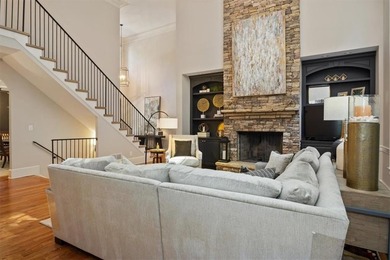 Discover timeless elegance and modern comfort in this on Woodmont Golf and Country Club in Georgia - for sale on GolfHomes.com, golf home, golf lot