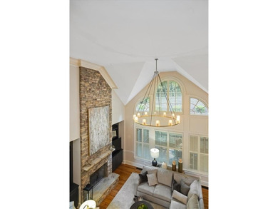 Discover timeless elegance and modern comfort in this on Woodmont Golf and Country Club in Georgia - for sale on GolfHomes.com, golf home, golf lot