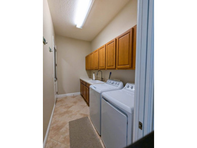 This beautiful Hidden Lakes resort home comes furnished and on The Great Outdoors Golf and Country Club in Florida - for sale on GolfHomes.com, golf home, golf lot