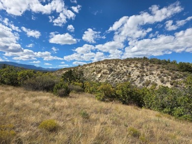 Escape to the foothills of Southern Colorado with this rare 1 on Hollydot Golf Course in Colorado - for sale on GolfHomes.com, golf home, golf lot