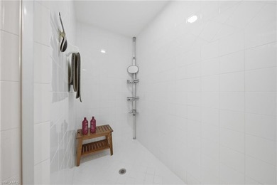 Fresh, light-filled and offered turnkey, this first-floor coach on The Rookery At Marco in Florida - for sale on GolfHomes.com, golf home, golf lot