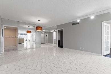 Welcome to your new home! This fantastic 1st floor, 3-bedroom, 2 on Palm-Aire Country Club and Resort - The Oaks in Florida - for sale on GolfHomes.com, golf home, golf lot
