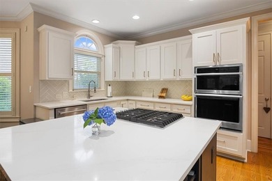 Discover timeless elegance and modern comfort in this on Woodmont Golf and Country Club in Georgia - for sale on GolfHomes.com, golf home, golf lot