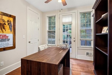 Discover timeless elegance and modern comfort in this on Woodmont Golf and Country Club in Georgia - for sale on GolfHomes.com, golf home, golf lot