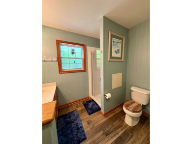 This cozy 2 bedroom 2 bath home located in a quiet section of on Captains Cove Golf and Yacht Club in Virginia - for sale on GolfHomes.com, golf home, golf lot
