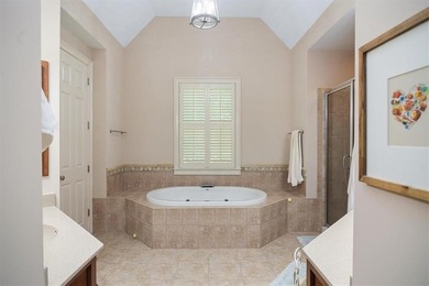 Discover timeless elegance and modern comfort in this on Woodmont Golf and Country Club in Georgia - for sale on GolfHomes.com, golf home, golf lot