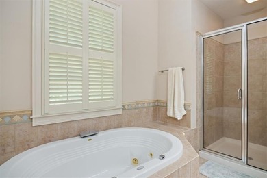 Discover timeless elegance and modern comfort in this on Woodmont Golf and Country Club in Georgia - for sale on GolfHomes.com, golf home, golf lot