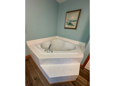 This cozy 2 bedroom 2 bath home located in a quiet section of on Captains Cove Golf and Yacht Club in Virginia - for sale on GolfHomes.com, golf home, golf lot