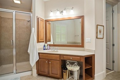 Discover timeless elegance and modern comfort in this on Woodmont Golf and Country Club in Georgia - for sale on GolfHomes.com, golf home, golf lot