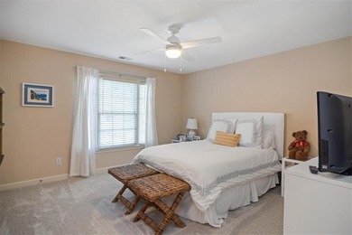 Discover timeless elegance and modern comfort in this on Woodmont Golf and Country Club in Georgia - for sale on GolfHomes.com, golf home, golf lot