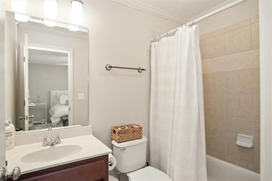 Discover timeless elegance and modern comfort in this on Woodmont Golf and Country Club in Georgia - for sale on GolfHomes.com, golf home, golf lot