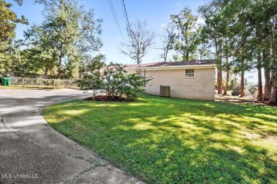 Welcome to your dream home in the heart of the serene and on Gulf Hills Golf Club in Mississippi - for sale on GolfHomes.com, golf home, golf lot